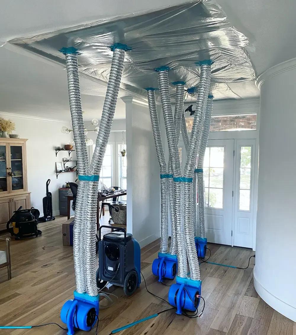 Sealed ceiling containment with ducted air movers and dehumidifier