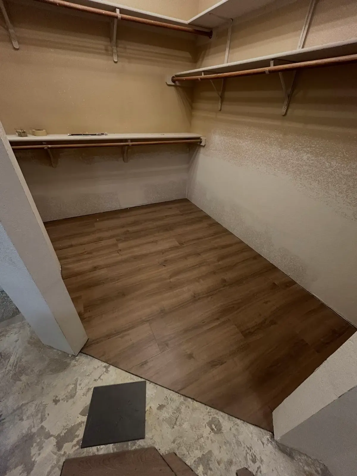 Closet rebuilt with new drywall and LVP after a flood cut