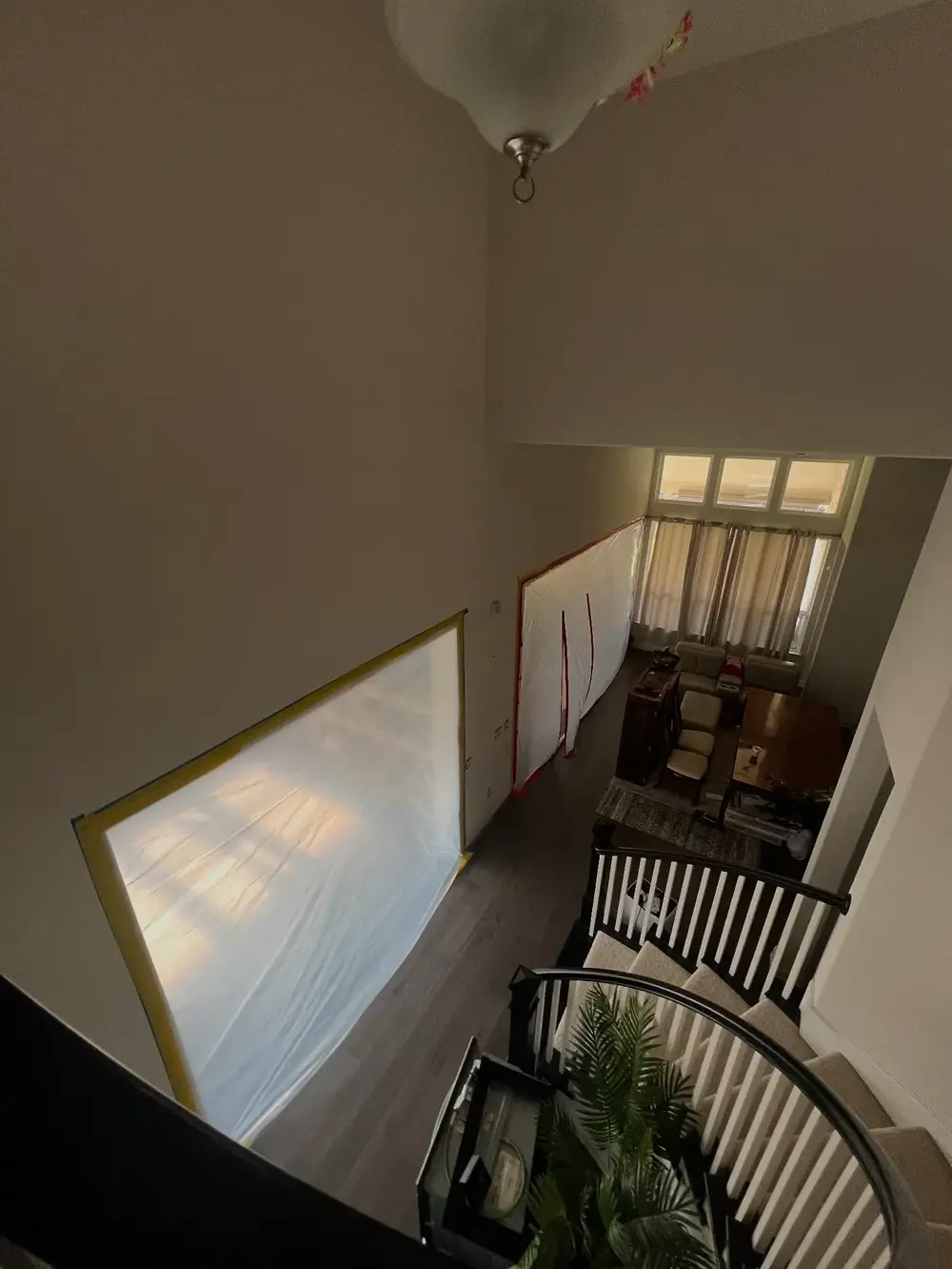 Two-story foyer under containment during drying