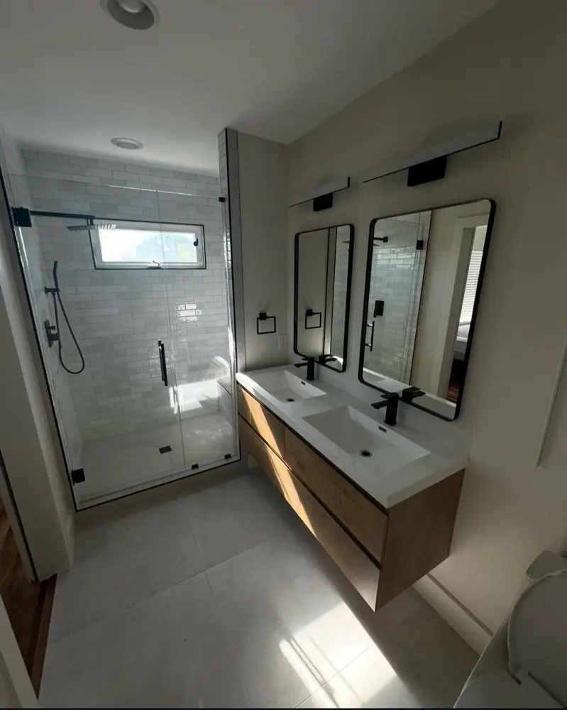 Finished modern bathroom — double vanity and walk-in shower