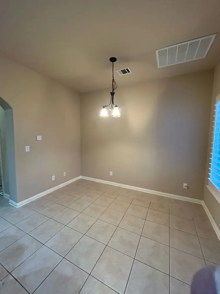 Finished dining room with tile floor and new paint