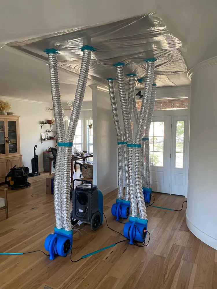 Ducted drying system running in a flooded living area